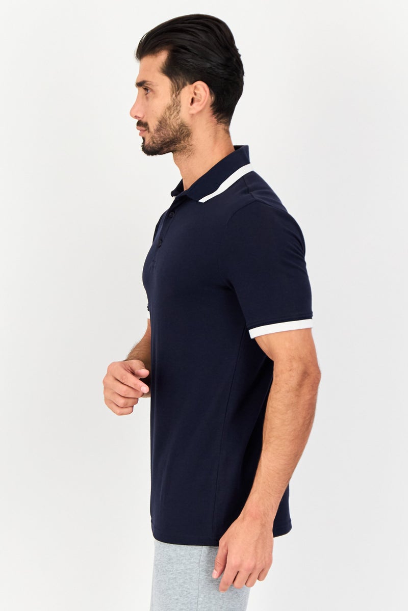 PUMA قميص بولو رياضي للرجال بأكمام قصيرة، خارجي، لون كحلي - Image 4